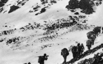 The Red Army crossing the Jiajinshan Mountain during the Long March.