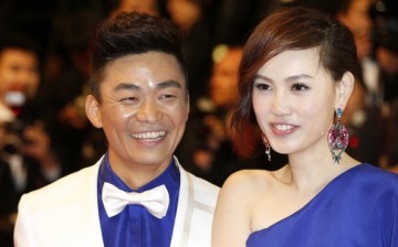 Chinese actor Wang Baoqiang (L) and his wife Ma Rong pose on May 17, 2013 as they arrive for the screening of the film 'Tian Zhu Ding' (A Touch of Sin) the Cannes Film Festival.