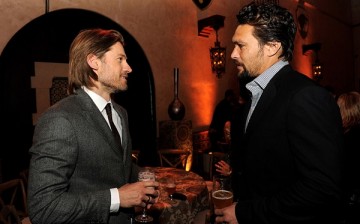 Nikolaj Coster-Waldau and Jason Momoa pose at the after party for the premiere of HBO's 'Game Of Thrones' at the Roosevelt Hotel on March 18, 2013 in Los Angeles, California. 