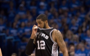 LaMarcus Aldridge pauses as he watches game action against the Oklahoma City Thunder during the second half of Game Six of the Western Conference Semifinals during the 2016 NBA Playoffs.
