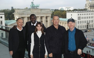 Dan Brown, Omar Sy, Felicity Jones, Tom Hanks and Ron Howard attend the photocall for 'Inferno' near the Brandenburg Gate at Akademie der Kuenste on October 10, 2016 in Berlin, Germany. 