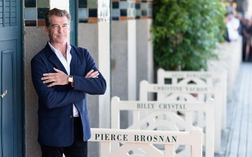 Pierce Brosnan unveils his cabin sign as a tribute for his career along the promenade des planches during the 40th Deauville American film festival on September 12, 2014 in Deauville, France. (Photo by Pascal Le Segretain/Getty Images)