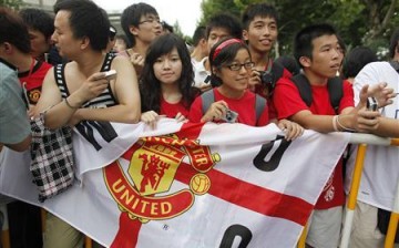 Chinese soccer fans regularly follow matches in the English Premier League.