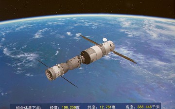 A photo from the Beijing Aerospace Control Center shows a simulated picture of an automated docking between the Shenzhou 11 manned spacecraft and the orbiting space lab Tiangong-2.
