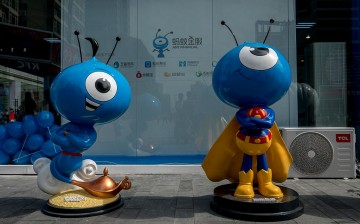 Mascots of Ant Financial, the country's leading fintech company, is displayed during the launching of an integrated wealth management app.