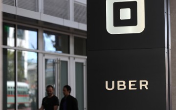 The logo of the ride-sharing service Uber is seen in front of its headquarters on Aug. 26, 2016, in San Francisco, California.