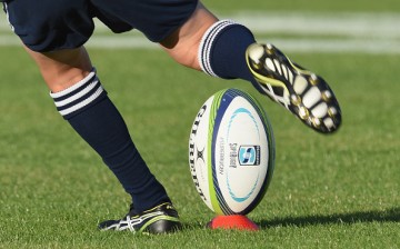 A rugby ball is kicked during a rugby match on March 19, 2016, in Christchurch, New Zealand.