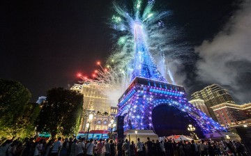 People watch the fireworks display during the opening of the Sands new mega resort, The Parisian, in Macau in September this year.