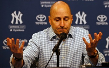 Brian Cashman talks during a press conference before a game against the New York Mets at Citi Field on August 1, 2016.