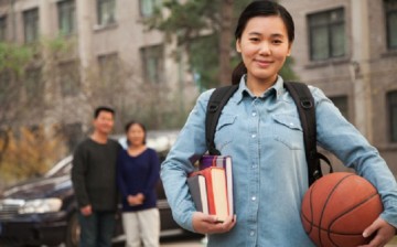 Books, ball and a belle: Chinese students studying abroad impressed the school of their choice either by their grades or background in sports--sometimes even by both.