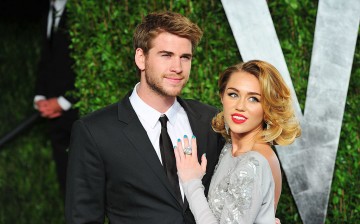  Actor Liam Hemsworth(L) and actress/singer Miley Cyrus arrive at the 2012 Vanity Fair Oscar Party hosted by Graydon Carter at Sunset Tower on February 26, 2012 in West Hollywood, California.