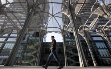 A man walks past the office buildings at the Tsinghua University Science Park (Tuspark) in the Shangdi area of Beijing.