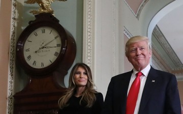 President-elect Donald Trump and his wife Melania Trump walk from a meeting with Senate Majority Leader Mitch McConnell at the U.S. Capitol November 10, 2016 in Washington, DC. 