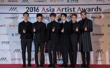 South Korean K-pop group 'Exo' pose on the red carpet of the '2016 Asia Artist Awards' in Seoul on November 16, 2016.