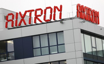Aixtron's signage is displayed on top of its headquarters in Herzogenrath, western Germany.