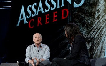 Frank Marshall, producer of the film 'Assassins Creed' talks with actress and host Aisha Tyler during an Ubisoft news conference before the start of the E3 Gaming Conference on June 13, 2016 in Los Angeles, California.
