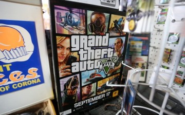 A poster promoting Grand Theft Auto V is displayed at the 8 Bit & Up video games shop in Manhattan's East Village on September 18, 2013 in New York City. The video game raked in more than $800 million in sales in its first 24 hours on the shelves. 