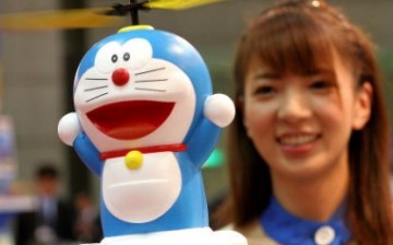 A radio controlled Japanese cartoon character 'Doraemon' flies during the Tokyo Toy Show 2005 hosted by Japan Toy Association on July 21, 2005 in Tokyo, Japan. 