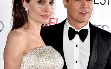 Actress/director Angelina Jolie Pitt (L) and husband actor Brad Pitt arrive at the AFI FEST 2015 presented by Audi opening night gala premiere of Universal Pictures' 'By The Sea' at the Chinese Theatre on November 5, 2015 in Los Angeles, California. 