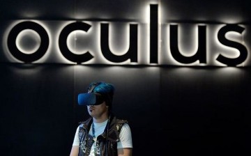A gamer uses an Oculus Rift headset in the Oculus booth during the annual E3 2016 gaming conference at the Los Angeles Convention Center on June 14, 2016 in Los Angeles, California.