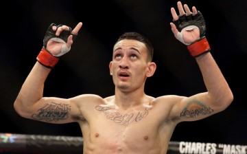 UFC interim featherweight title contender Max Holloway berates Jose Aldo for not fighting him at UFC 206.