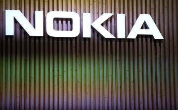 A logo sits illuminated outside the Nokia pavilion during the second day of the Mobile World Congress 2015 at the Fira Gran Via complex on March 3, 2015 in Barcelona, Spain. 