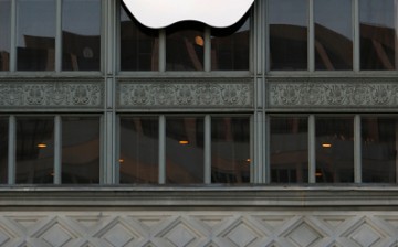 An Apple logo hangs outside Bill Graham Civic Auditorium on Sept. 7, 2016, in San Francisco, California.
