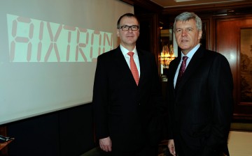 Aixtron CEO Paul Hyland and CFO Wolfgang Breme at the Aixtron AG headquarters during a press conference.