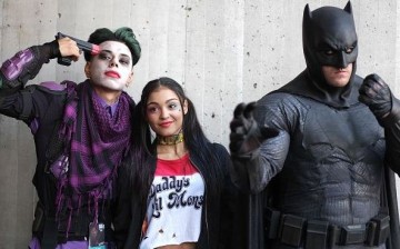 Cosplayer's dressed as The Joker, Harley Quinn and Batman attend the New York Comic Con 2016 at The Jacob K. Javits Convention Center on October 7, 2016 in New York City. 