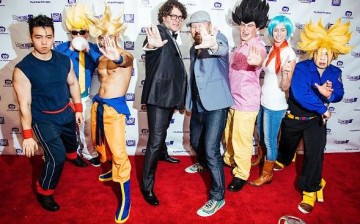 Christopher Sabat (L) and Sean Schemmel pose with fans in costumes at the 'Dragon Ball Z: Resurrection 'F'' premiere at AMC Empire 25 theater on August 3, 2015 in New York City. 