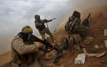 Iraqi Army soldiers do battle in Mosul.           