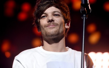 Louis Tomlinson performs onstage during 106.1 KISS FM's Jingle Ball 2015 presented by Capital One at American Airlines Center on December 1, 2015 in Dallas, Texas. 