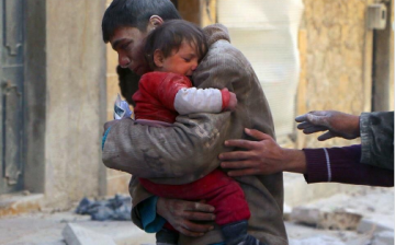 Man and child trying to escape Aleppo crackdown