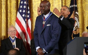 President Barack Obama awards the Presidential Medal of Freedom to National Basketball Association Hall of Fame member and legendary athlete Michael Jordan during a ceremony in the East Room of the White House November 22, 2016 in Washington, DC. 