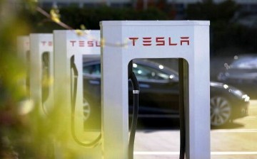 A row of new Tesla Superchargers are seen outside of the Tesla Factory on August 16, 2013 in Fremont, California. Tesla Motors opened a new Supercharger station with four stalls for public use at their factory in Fremont, California
