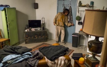 Daryl raids Dwight's room.