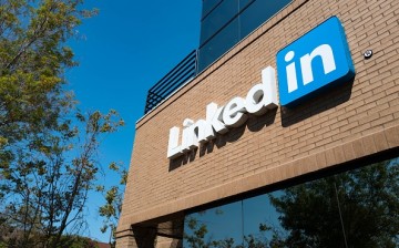 The sign and logo of LinkedIn seen at the entrance of office