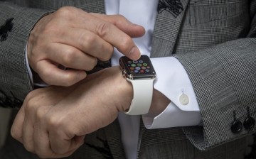 Hajime Shimada shows off his newly purchased Apple Watch outside boutique store, Dover Street Market Ginza on April 24, 2015 in Tokyo, Japan. 