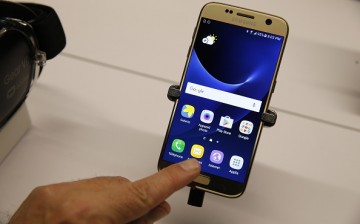 A user checks Samsung Galaxy S7 smartphone