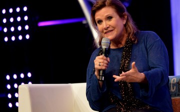 Carrie Fisher attends a Star Wars Celebration event in Messe Essen, Germany in 2013.