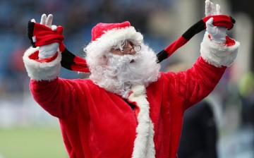 A man dressed up as Santa Claus spotted during a football match in the Scottish Premier League.