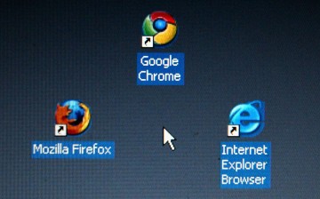 Google's Chrome browser shortcut, Google Inc.'s new Web browser, is displayed next to Mozilla Firefox shortcut and Microsoft's Internet Explorer browser shortcut, on an laptop. 