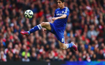 Oscar, then of Chelsea, controls the ball during the Barclays Premier League match against Arsenal.