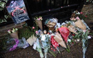 Fans leave flowers for music icon George Michael at his home in Highgate Village, North London.