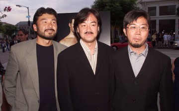 Jun Aida, Hironobu Sakaguchi and Motonori Sakakibara attend the premiere of 'Final Fantasy: The Spirits Within' at the Bruin Theater on July 2, 2001.