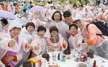Chinese visitors attend event of samgyetang tasting as South Koreas capital Seoul is bustling with a huge group of tasting samgyetang in Seoul, South Korea on May 6, 2016.