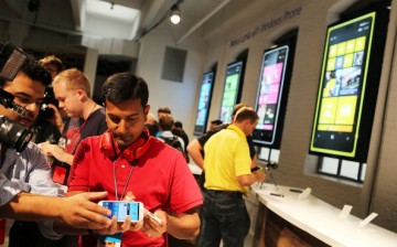  The media attends the launch of the new Nokia Lumia 920 and 820 Windows smartphones on September 5, 2012 in New York City. 