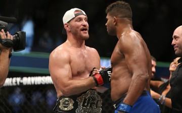 UFC heavyweight champ Stipe Miocic shakes the hand of Alistair Overeem during the UFC 203 event at Quicken Loans Arena on September 10, 2016 in Cleveland, Ohio.