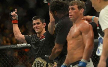 Dominick Cruz gets his arm raised by referee Herb Dean after he beat Uriah Faber in their bantamweight championship match held at UFC 199 last June 4, 2016.