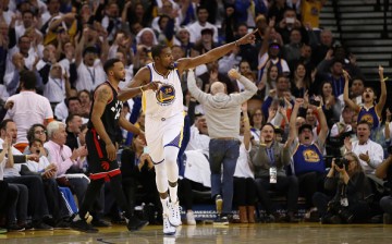 Kevin Durant of the Golden State Warriors reacts during their game against the Toronto Raptors at ORACLE Arena on December 28, 2016 in Oakland, California. 